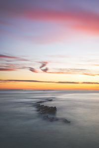 Preview wallpaper fog, rocks, horizon, dusk, landscape