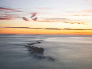 Preview wallpaper fog, rocks, horizon, dusk, landscape