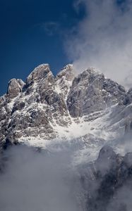 Preview wallpaper fog, rocks, mountain, snowy, snow