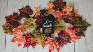 Preview wallpaper foliage, halloween, autumn, inscription