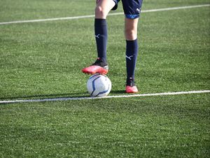 Preview wallpaper football, footballer, legs, ball, field