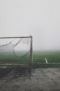 Preview wallpaper football gate, torn, fog, lawn, mood, gloomy