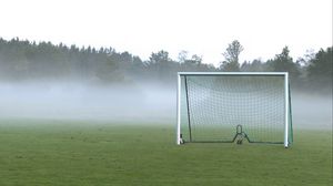 Preview wallpaper football goal, field, football, fog, trees, haze