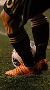 Preview wallpaper footballer, ball, football boots, lawn, half-hose