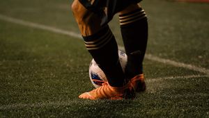 Preview wallpaper footballer, ball, football boots, lawn, half-hose