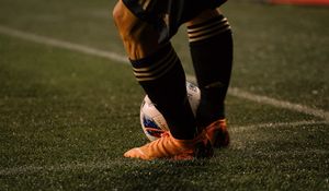 Preview wallpaper footballer, ball, football boots, lawn, half-hose