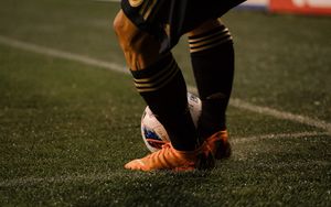 Preview wallpaper footballer, ball, football boots, lawn, half-hose