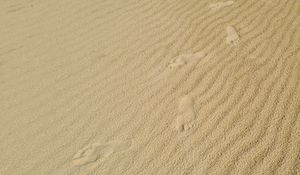 Preview wallpaper footprints, feet, sand, texture