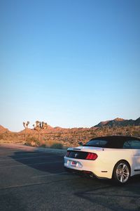 Preview wallpaper ford mustang, car, desert, rear bumper, travel