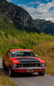 Preview wallpaper ford mustang, car, muscle car, red, road, mountains