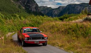 Preview wallpaper ford mustang, car, muscle car, red, road, mountains