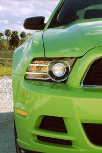 Preview wallpaper ford mustang, headlight, green, front view, sports car