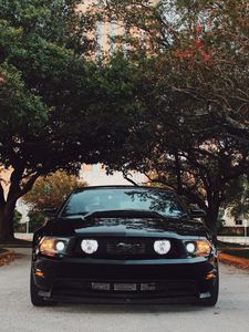 Preview wallpaper ford mustang, sports car, front view, black, trees