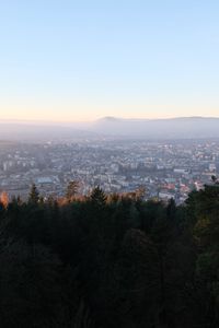 Preview wallpaper forest, city, mountain, horizon, sky, nature