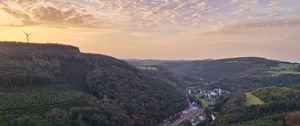 Preview wallpaper forest, hills, road, clouds, sky, dawn, nature