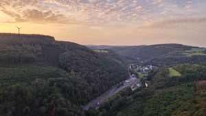Preview wallpaper forest, hills, road, clouds, sky, dawn, nature
