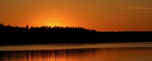 Preview wallpaper forest, silhouettes, lake, stones, twilight, dark, orange