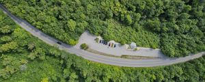 Preview wallpaper forest, trees, road, parking, cars, aerial view