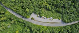 Preview wallpaper forest, trees, road, parking, cars, aerial view