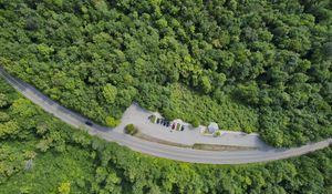 Preview wallpaper forest, trees, road, parking, cars, aerial view