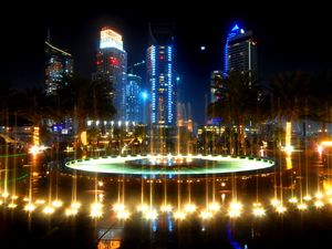 Preview wallpaper fountain, palm trees, street, lighting