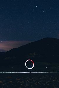Preview wallpaper freezelight, circle, glow, hill, starry sky, stars