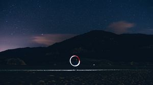 Preview wallpaper freezelight, circle, glow, hill, starry sky, stars