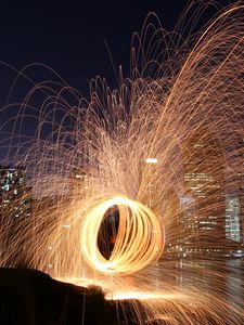 Preview wallpaper freezelight, sparks, night, city