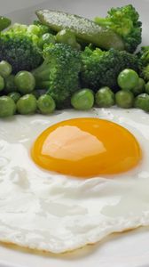 Preview wallpaper fried eggs, breakfast, peas, broccoli, greens, yolk