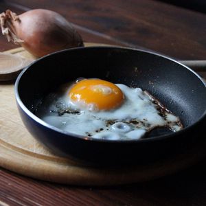 Preview wallpaper fried eggs, onion, pan, cutting board