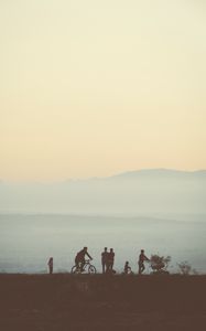 Preview wallpaper friends, silhouettes, mountains, nature, light