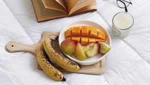 Preview wallpaper fruit, book, candle, aesthetics