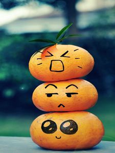 Preview wallpaper fruit, emoticons, smiley face, table, leaves, bokeh