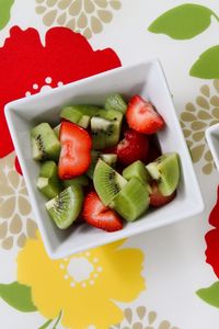 Preview wallpaper fruit salad, kiwi, strawberries, plates