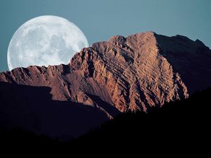 Preview wallpaper full moon, mountains, shadows, sky, disk
