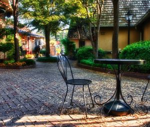 Preview wallpaper garden, plants, sculptures, houses, table, chairs, autumn, leaves