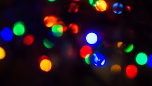 Preview wallpaper garland, bokeh, glare, colorful, dark