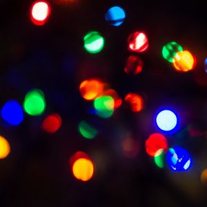 Preview wallpaper garland, bokeh, glare, colorful, dark