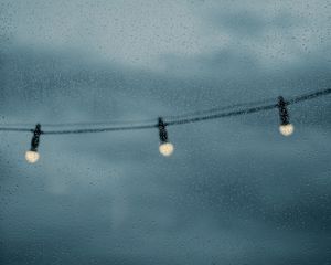 Preview wallpaper garland, bulbs, drops, wet, glass