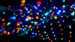 Preview wallpaper garland, glare, light, blur, colorful