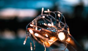 Preview wallpaper garland, hands, light, blur, light bulbs