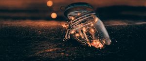 Preview wallpaper garland, jar, glow, glare, horizon, sunset