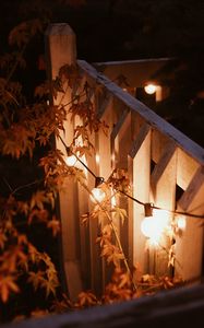 Preview wallpaper garland, lamps, glow, branches, evening