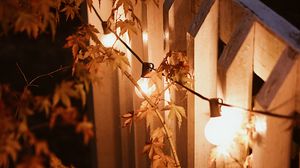 Preview wallpaper garland, lamps, glow, branches, evening