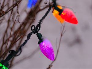 Preview wallpaper garland, snow, branches, blur, macro, purple