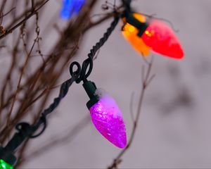 Preview wallpaper garland, snow, branches, blur, macro, purple