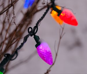 Preview wallpaper garland, snow, branches, blur, macro, purple