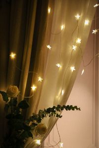 Preview wallpaper garland, stars, curtain, flowers, light, aesthetics