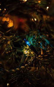 Preview wallpaper garland, tree, christmas, new year, glare, bokeh