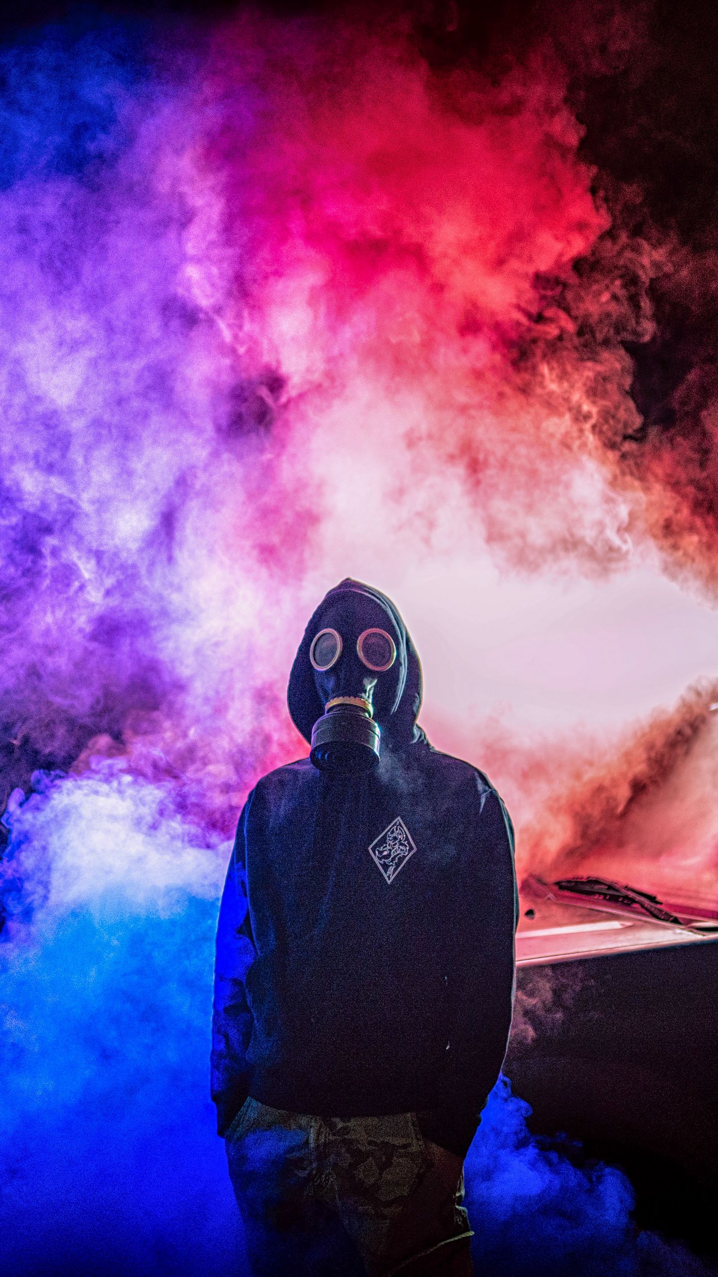 1440x2560 Wallpaper gas mask, man, smoke, colorful